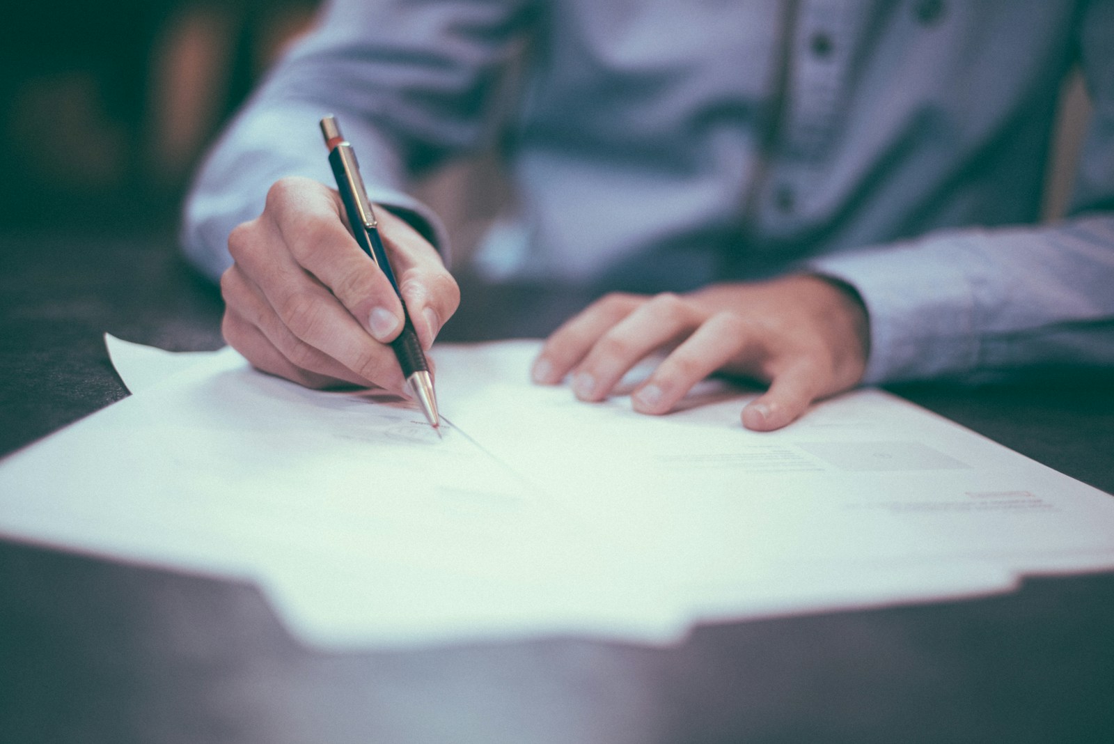 Contract review session with counsel annotations on commercial agreements